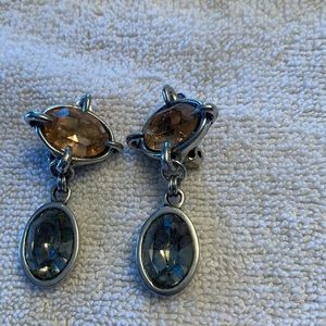 Beautiful dangle clip earrings with citrine and grey colored crystals in silver